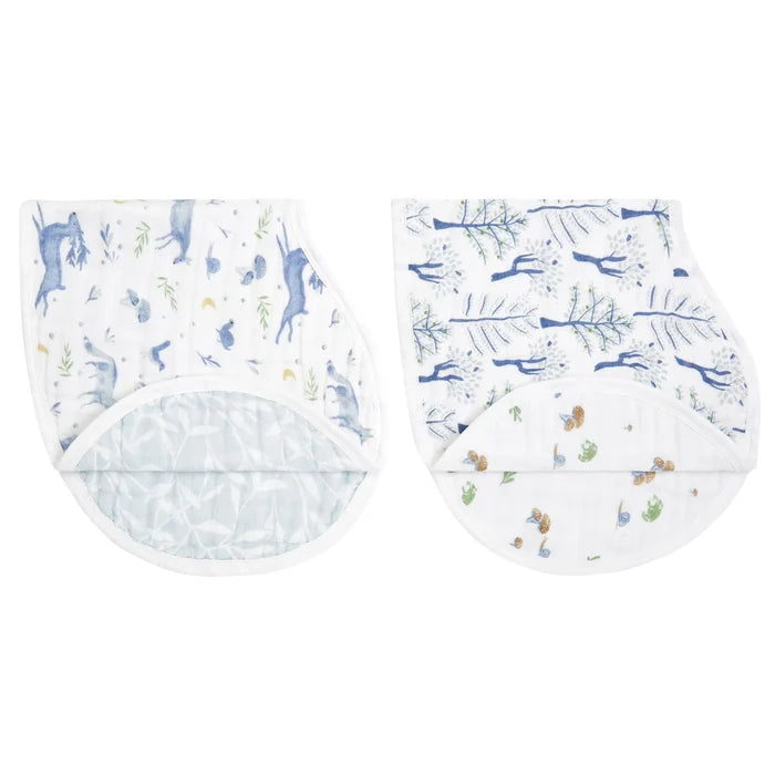 Two baby bibs with animal prints on a white background