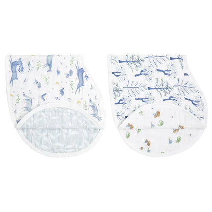 Two baby bibs with animal prints on a white background