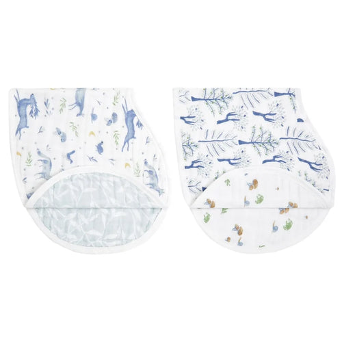 Two baby bibs with animal prints on a white background
