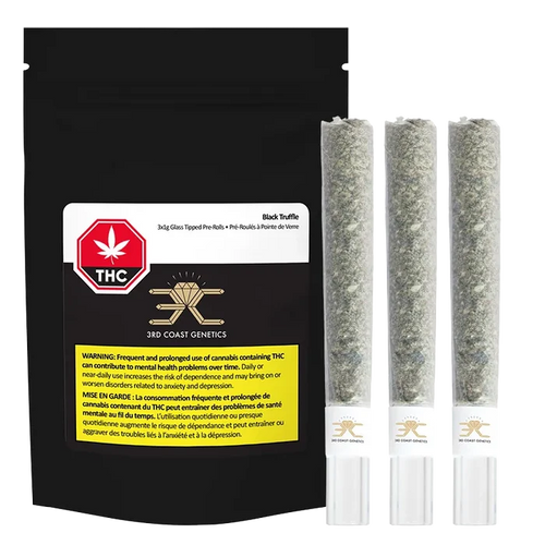 Front-facing shot of a black pouch alongside three glass-tipped joints, labeled "Black Truffle Glass Tip PR 3 x 1 g" and showing the 3rd Coast Genetics logo.