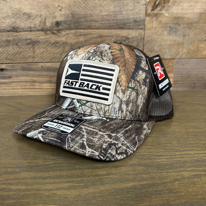 Fast Back Ropes Men's Flag Patch Trucker Cap in Realtree