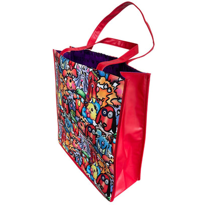 Side profile of the 'Furrfuggnoogins' vinyl tote revealing Debby Carman's vibrant character artwork.