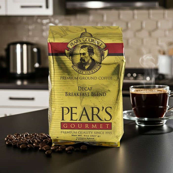 Pear's Gourmet coffee package on a kitchen counter with coffee beans and a cup of coffee.